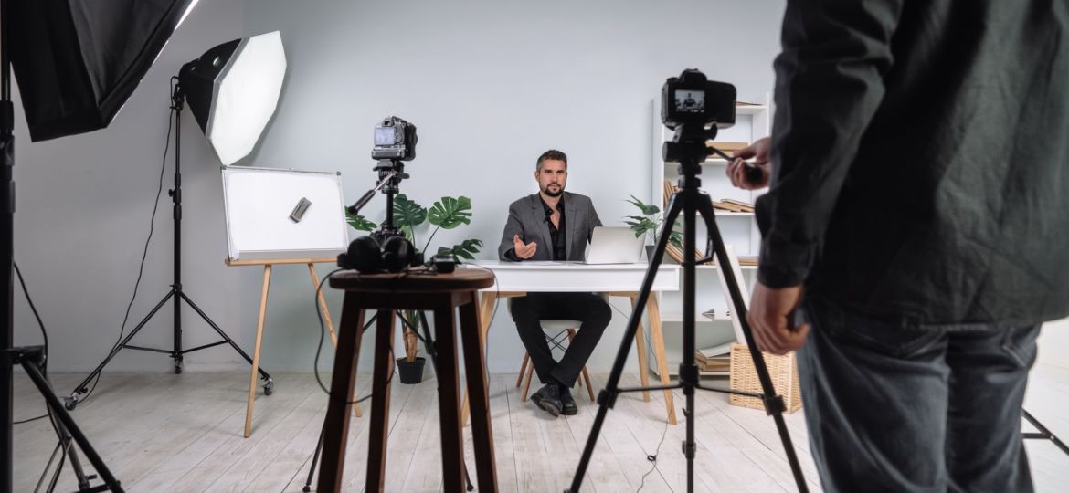 setting up a video studio to film someone
